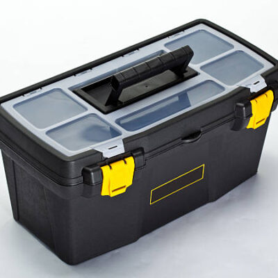 Black construction toolbox on white background