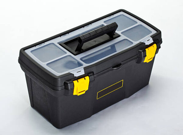 Black construction toolbox on white background